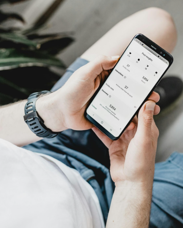 A person watching social media analytics